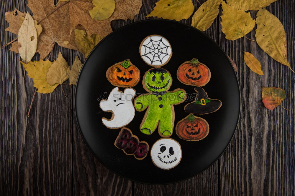 Similar – Image, Stock Photo Happy Halloween Dessert