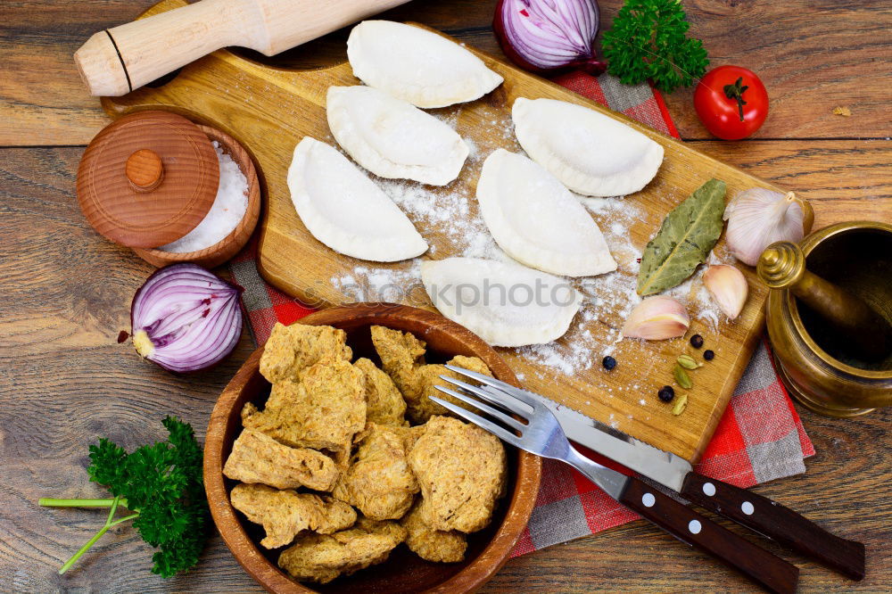 Similar – Image, Stock Photo Fresh salted pork fat on a kitchen board