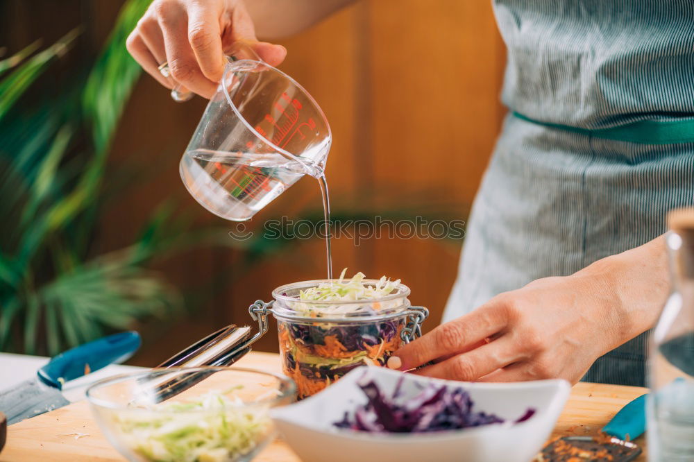 Similar – Crop woman eating sushi