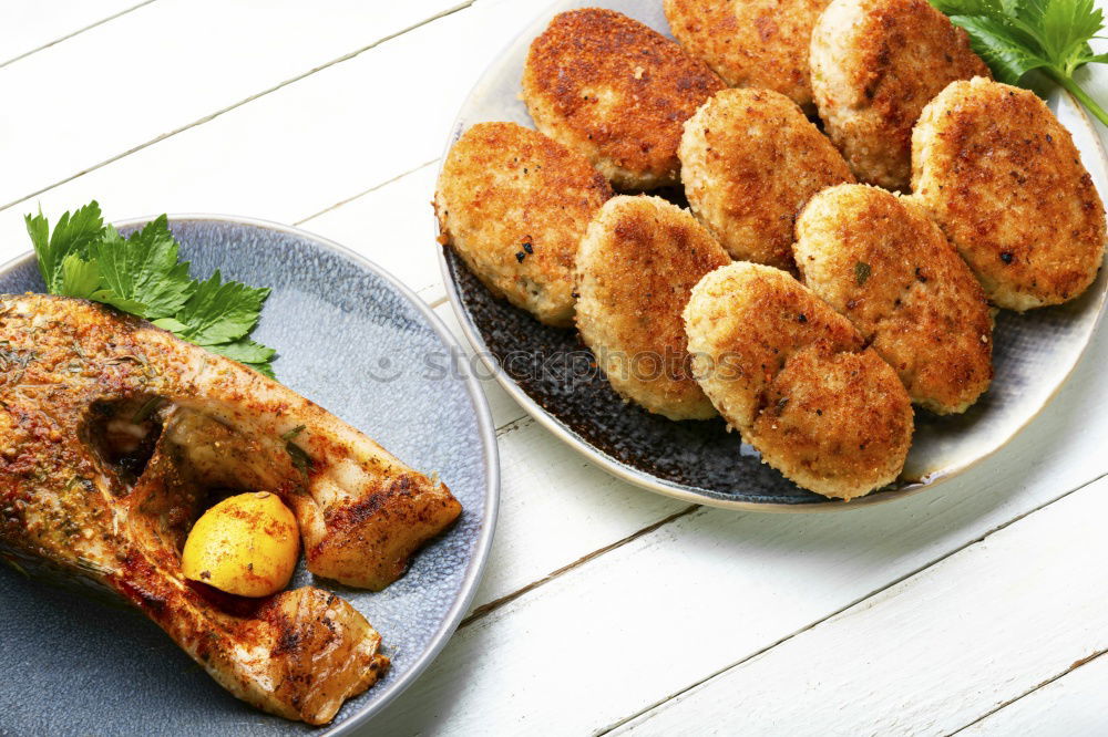 Similar – Image, Stock Photo Vegetable roasts from above on slate plate