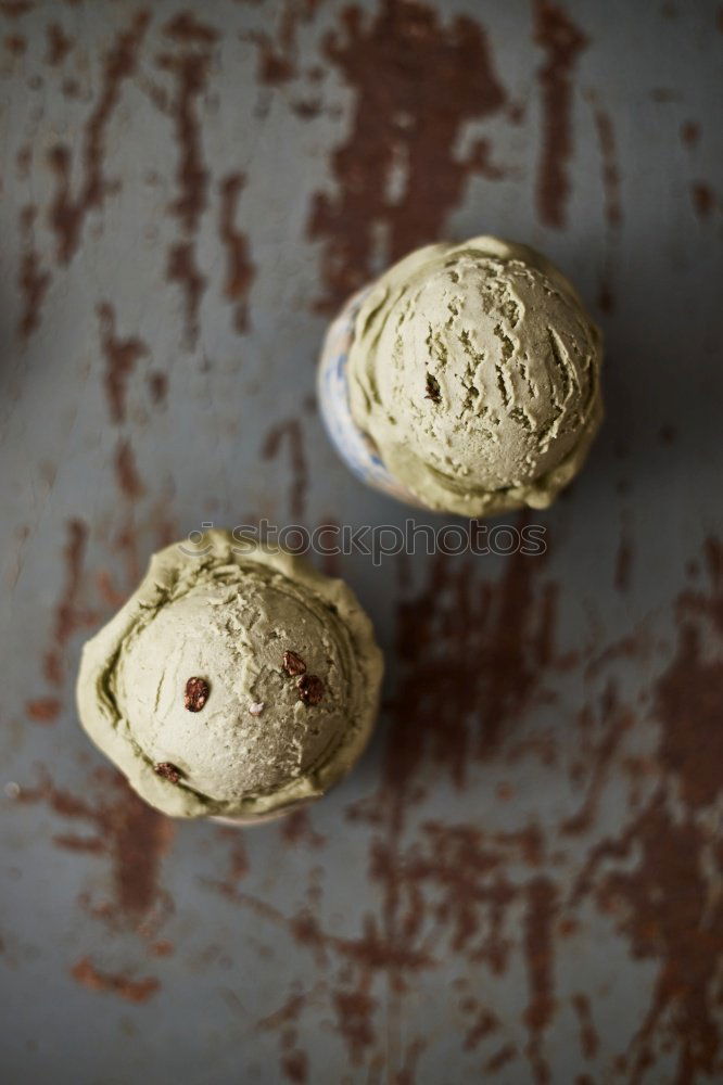 Similar – Meringue with cracks in old bowls