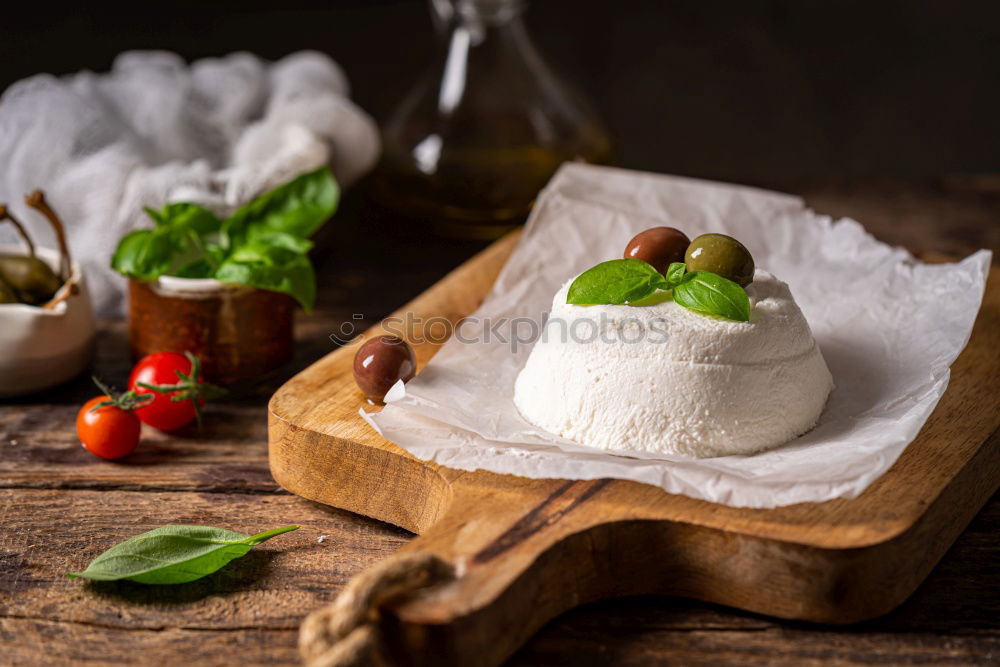 Image, Stock Photo Handmade ricotta cheese on a rustic kitchen table