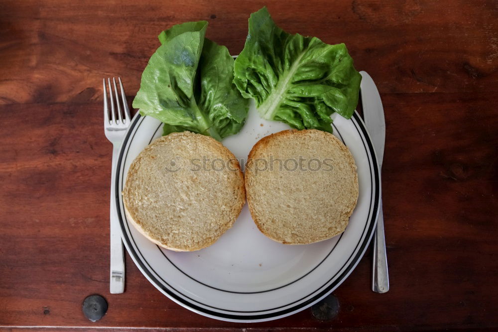 Similar – Foto Bild belegtes brötchen auf neun uhr