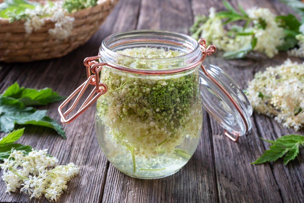 Similar – Image, Stock Photo Jar with Linden blossom on wooden table