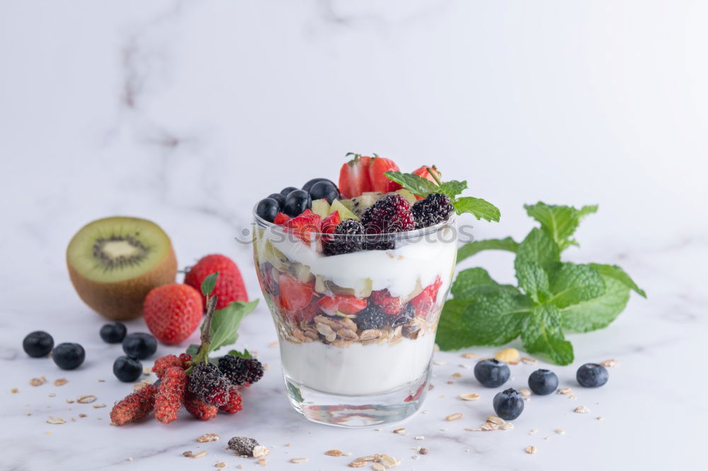 Similar – Oat flakes with milk and berries