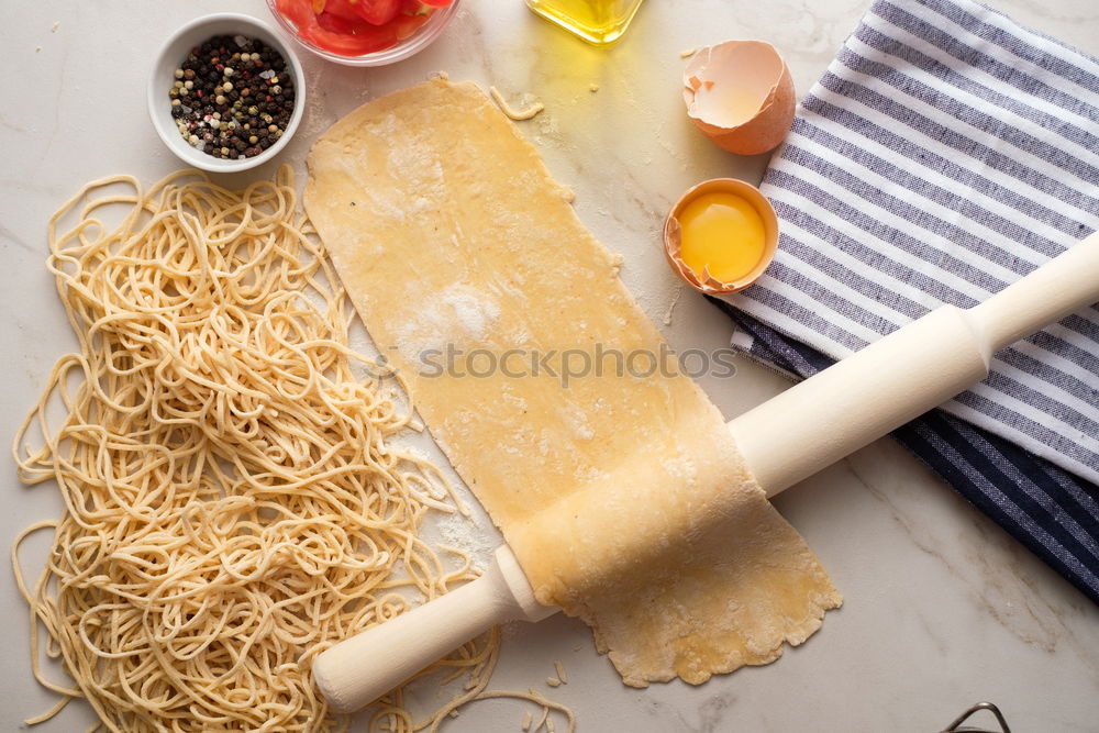 Image, Stock Photo Making homemade taglatelle with a pasta rolling cutter