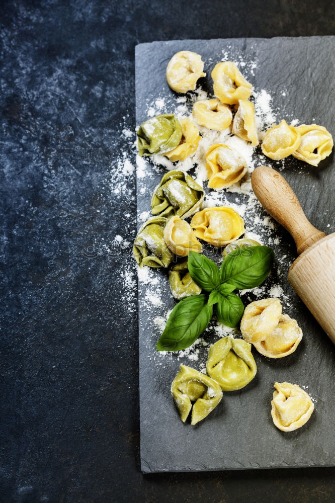 Similar – Image, Stock Photo Mushrooms and parsley on slate table.