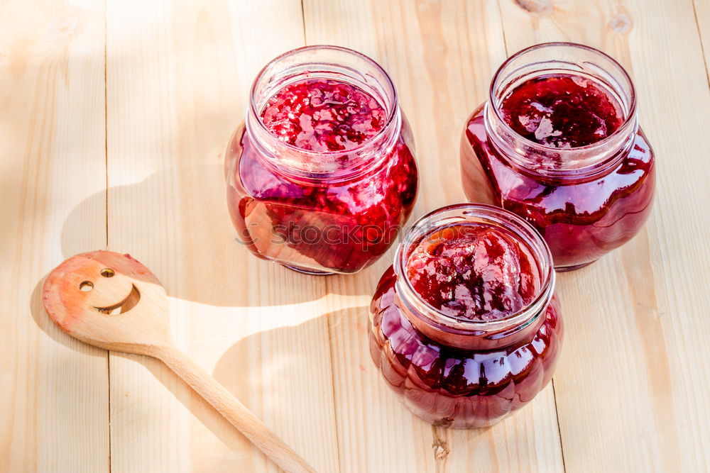 Homemade jam on wooden table