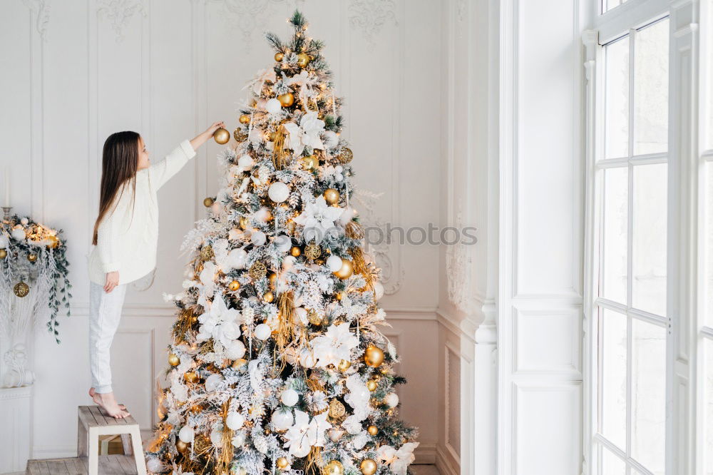 Similar – Christmas tree with decorations in the children’s room