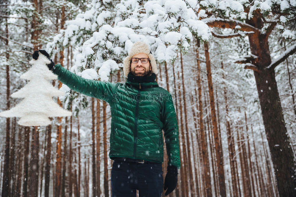 Image, Stock Photo Tourist standing in snowy forest