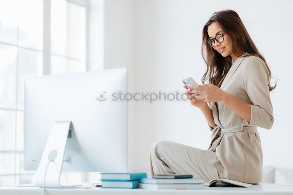 Similar – Image, Stock Photo brunette woman is using her computer while having a coffee
