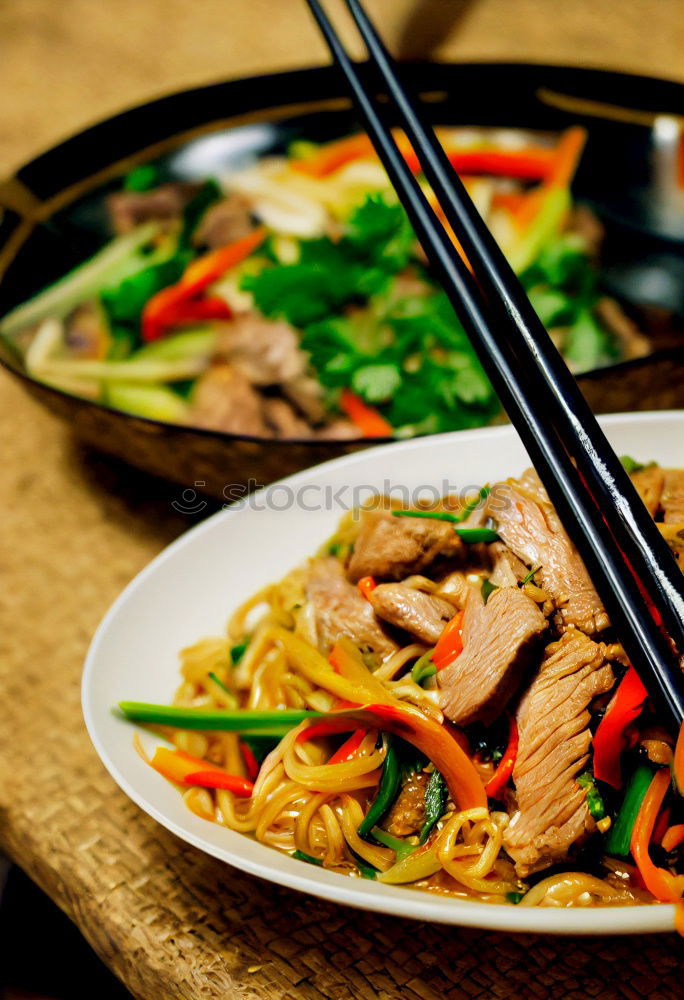 Similar – Image, Stock Photo Asian noodle pan with chicken and vegetables