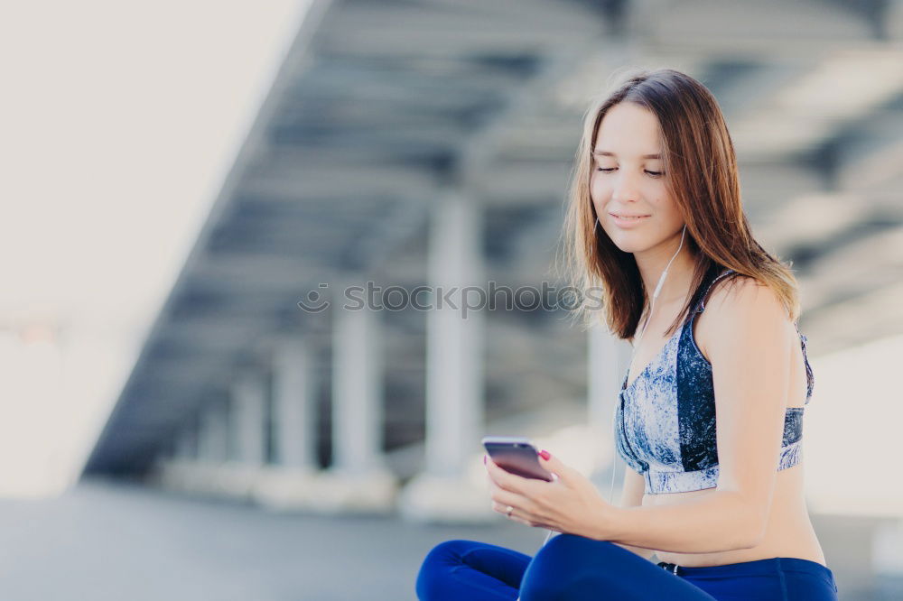 Similar – Image, Stock Photo Young woman with mobile phone walking a city street