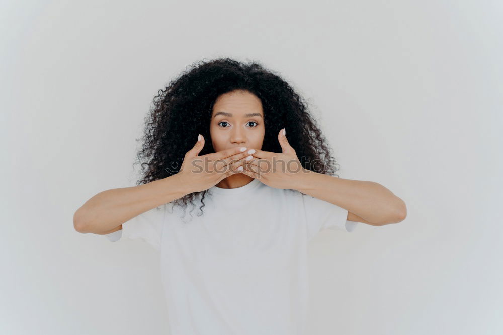 Similar – Beautiful serious thoughtful and sad black woman covering her head with sheet in bed