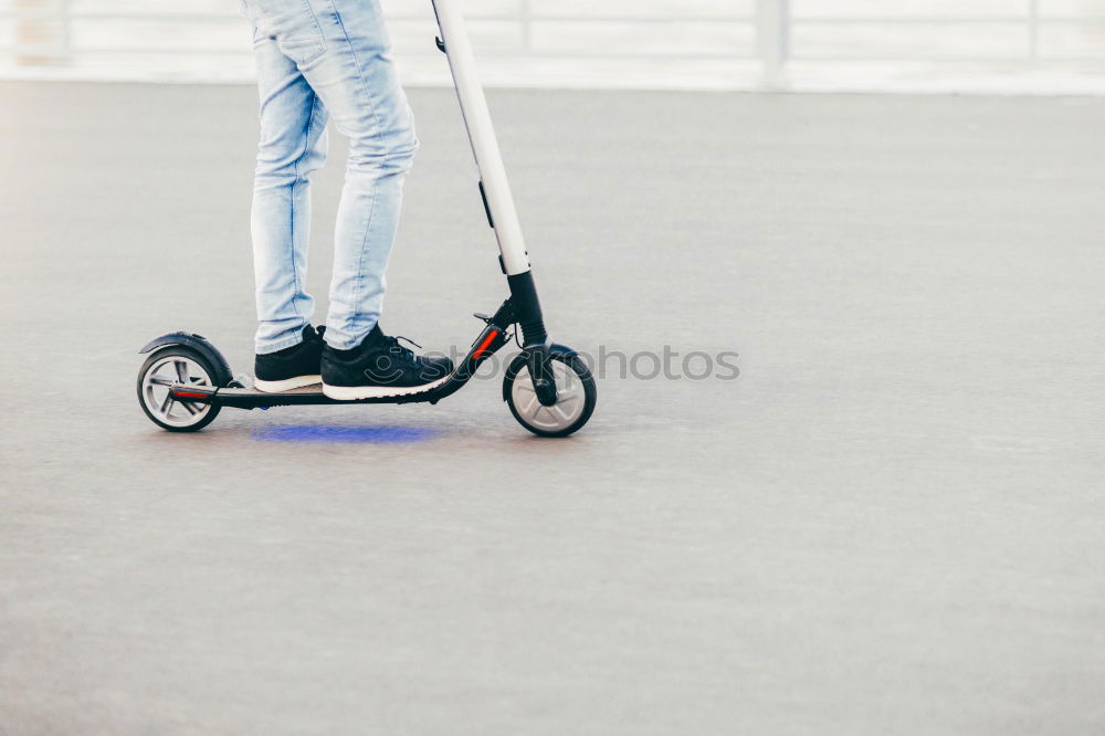 Similar – Foto Bild Frau mittleren Alters auf einem Elektroroller