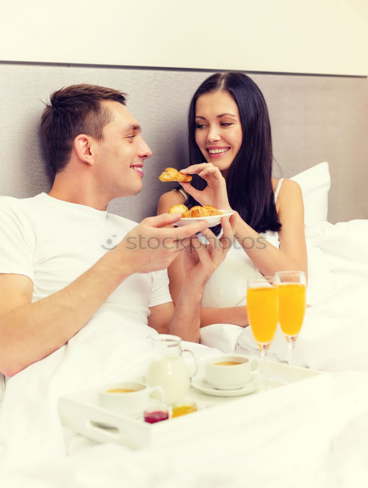 Similar – Image, Stock Photo Couple having breakfast in hotel