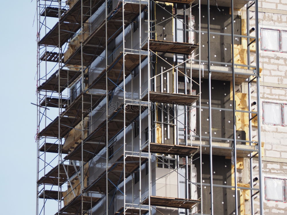 Similar – Foto Bild Bauzaun aus Holz vor dem Neubau eines Wohnhaus mit Baugerüst am ehemaligen Hafen in Offenbach am Main in Hessen