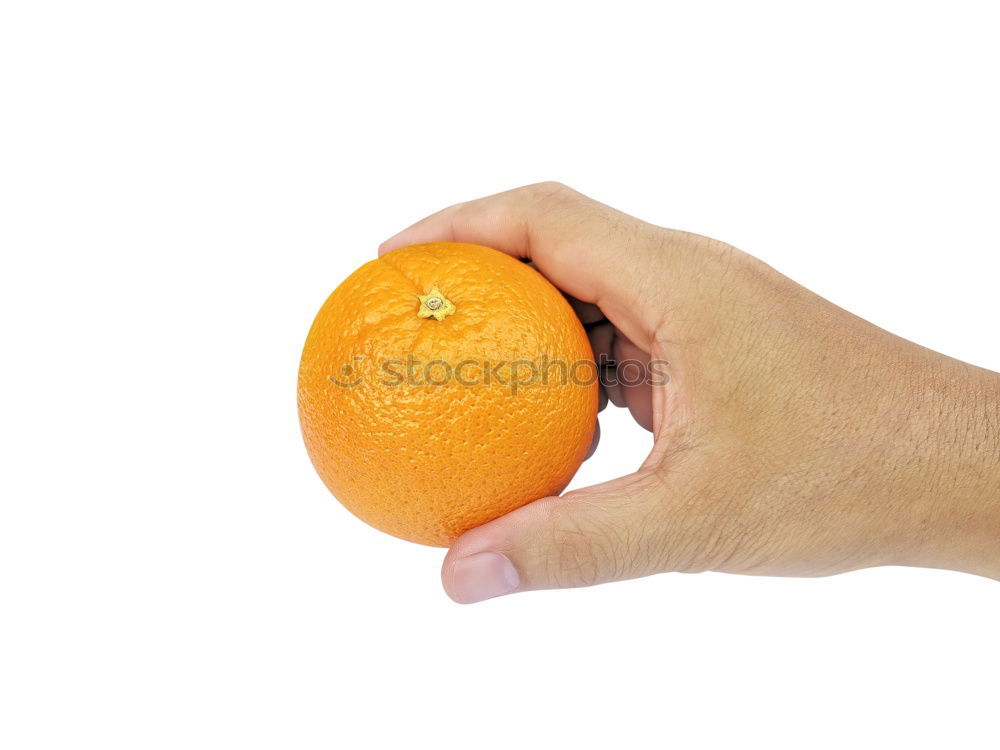 hand holding an orange in original shape