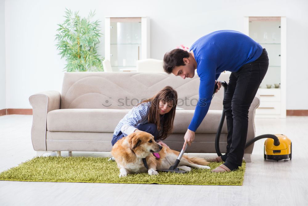 Similar – Image, Stock Photo Cheerful young man teaching his son to play mini golf