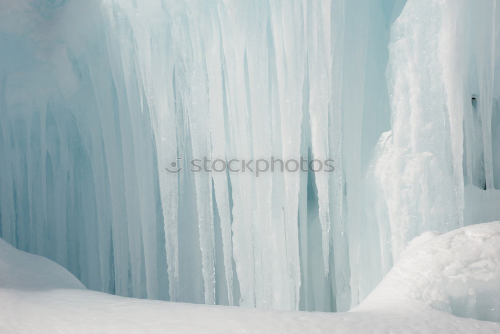 Similar – Man kneels in an ice desert at the Baltic Sea