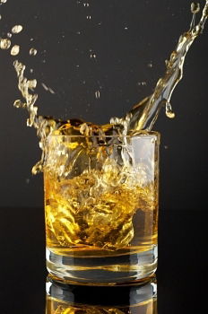 Similar – Glass of splashing whiskey