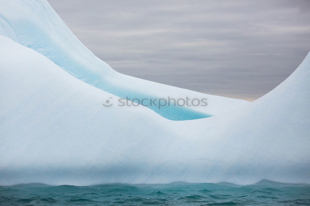 Similar – Wall of glacier in sea