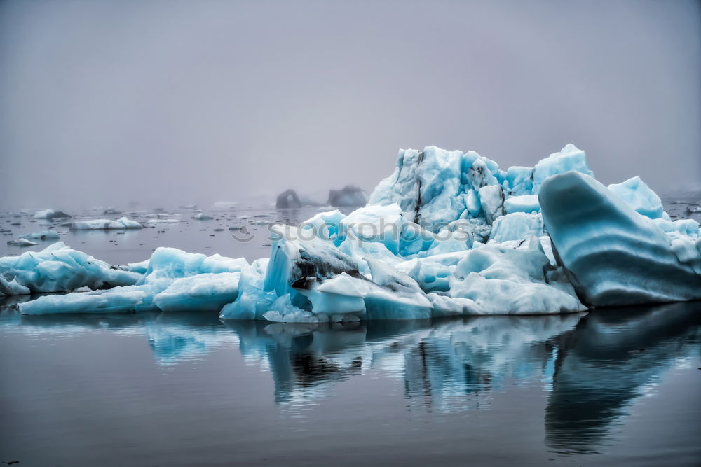 Similar – Wall of glacier in sea