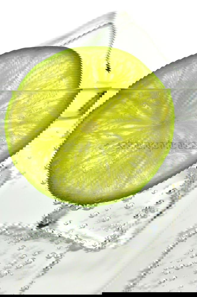Similar – Image, Stock Photo A glass of soft drink with tangerine, cucumber and straw on white background