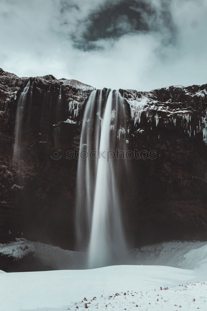 Similar – View of amazing waterfall on cloudy day