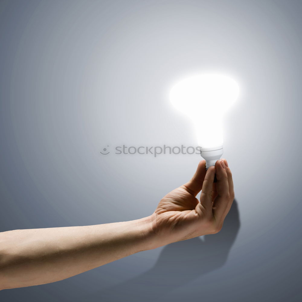 Similar – Female hand holding a shining light bulb, Great idea, innovation and inspiration, business concept background