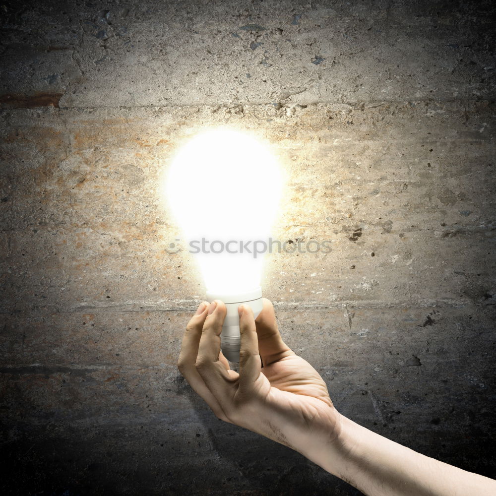 Similar – Female hand holding a shining light bulb, Great idea, innovation and inspiration, business concept background