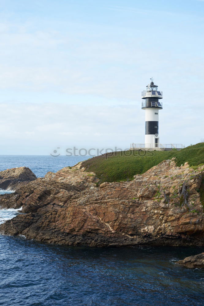 Similar – Image, Stock Photo Lighthouse in Cornwall with clouds in portrait format