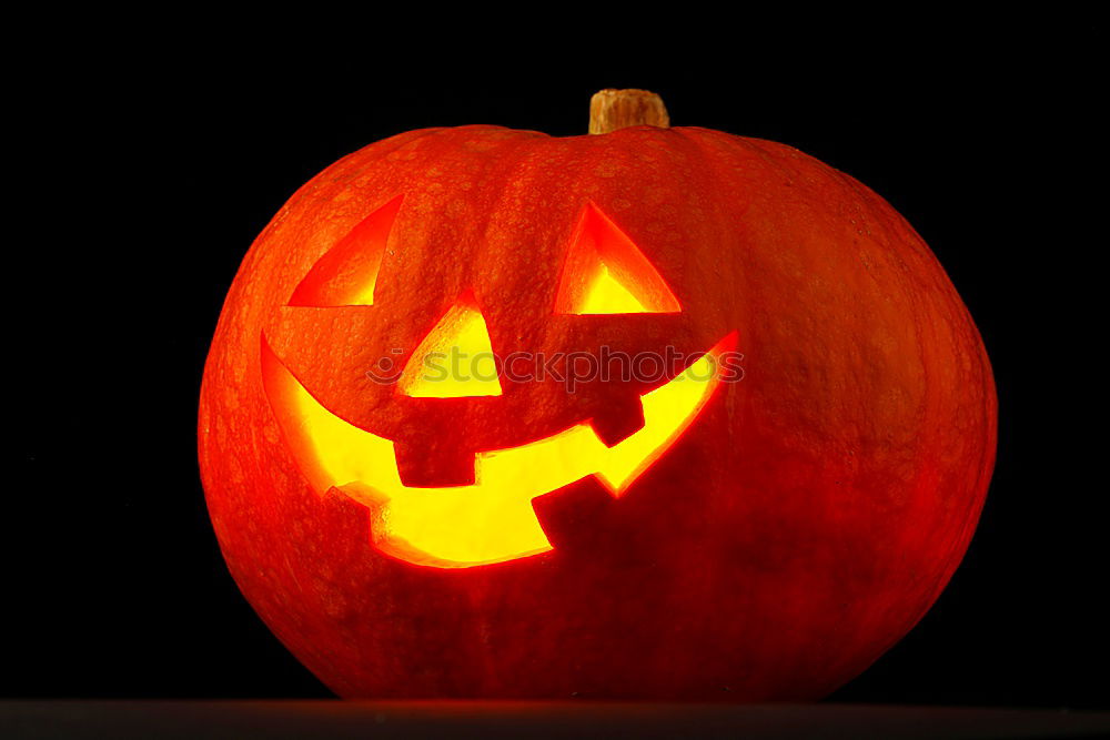 Similar – Image, Stock Photo Side view halloween pumpkin smile with fire burning eyes mouth