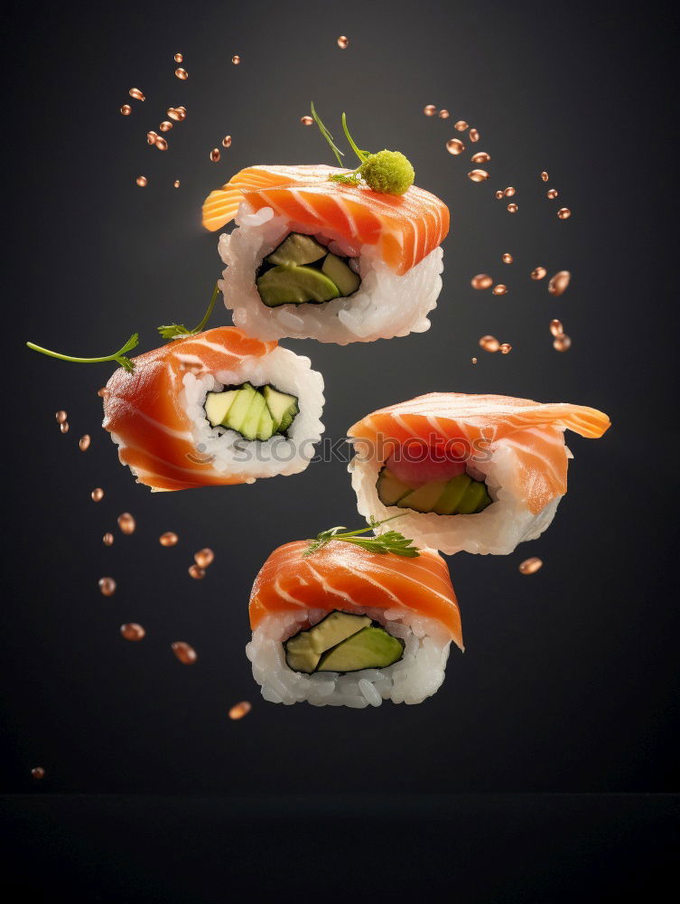 Similar – Japanese food: maki and nigiri sushi set on black background.