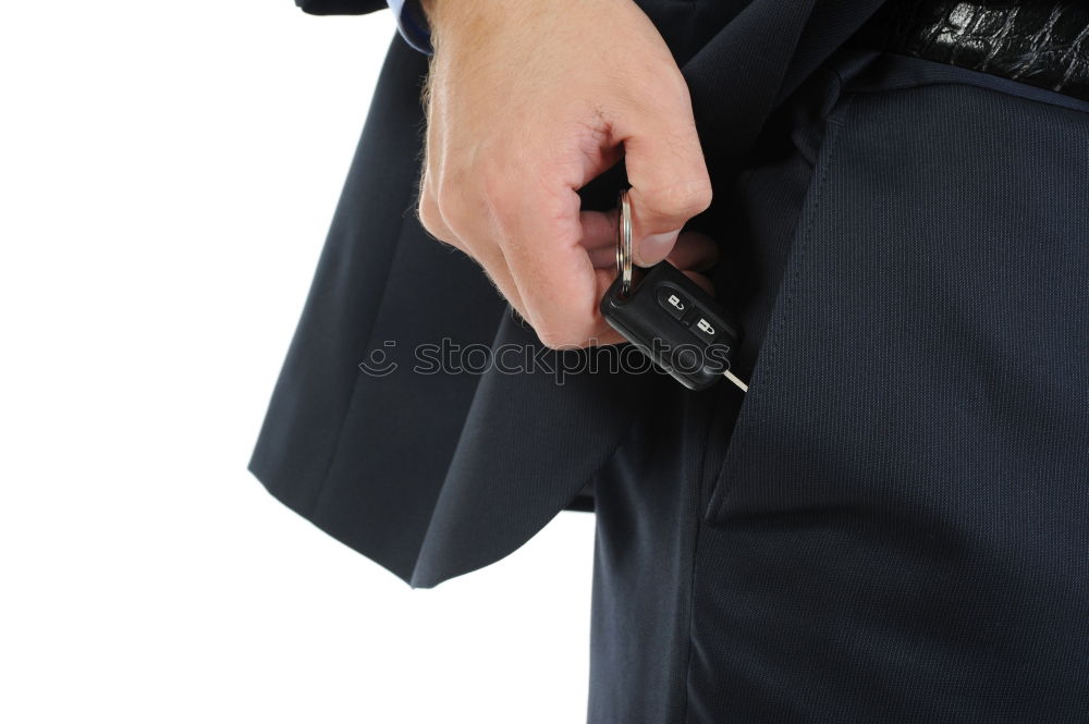 Similar – armed policeman with handcuffs from behind, partial view