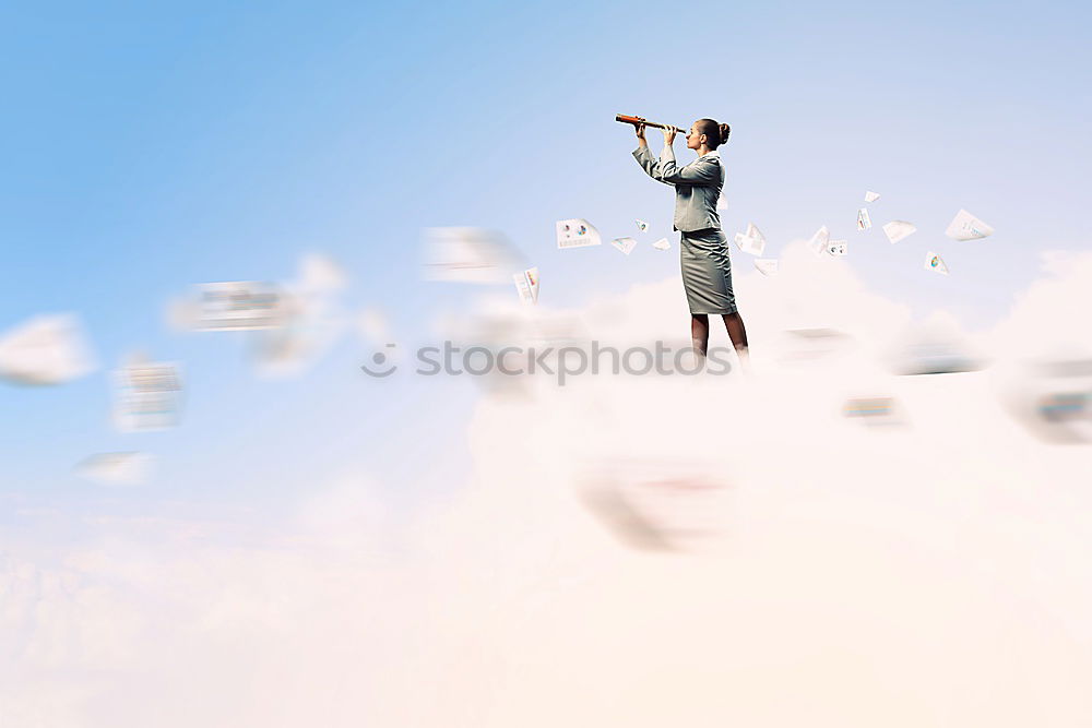 Similar – Image, Stock Photo A woman with a red cap stands in front of a wind turbine. Climate change. Alternative power generation. Renewable energy