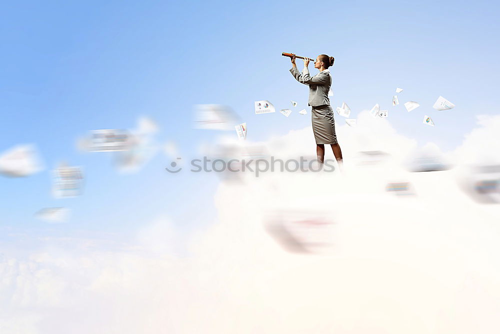 Similar – Image, Stock Photo A woman with a red cap stands in front of a wind turbine. Climate change. Alternative power generation. Renewable energy