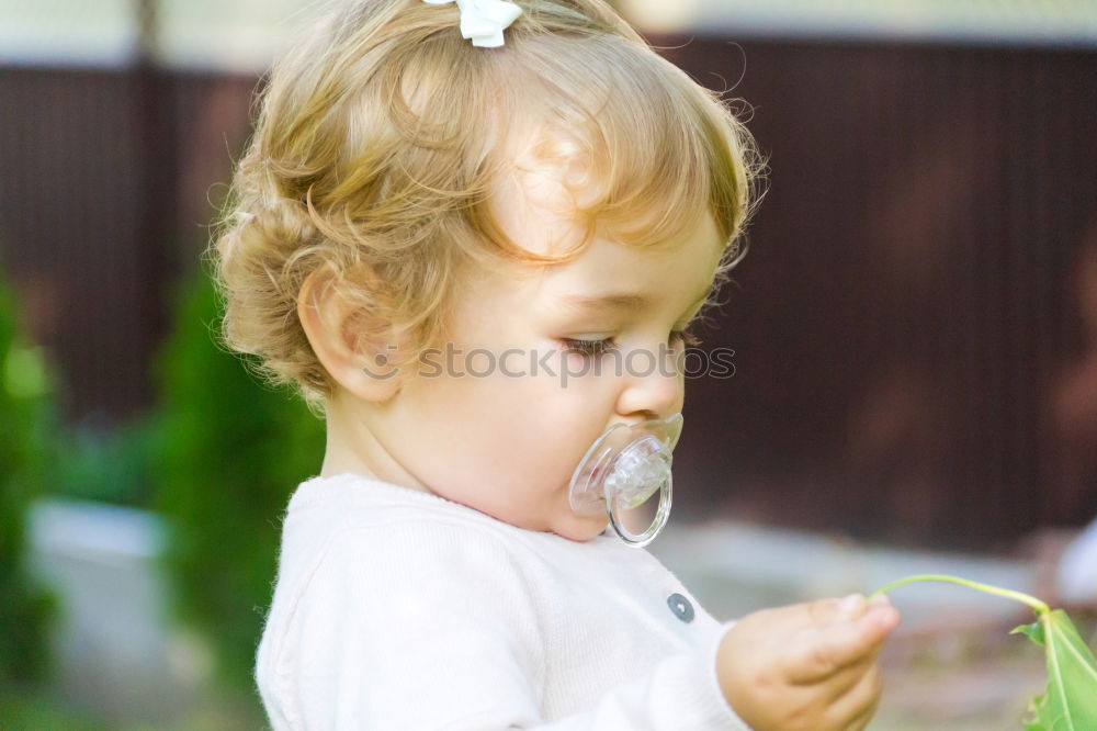 Similar – adorable boy watering the plants