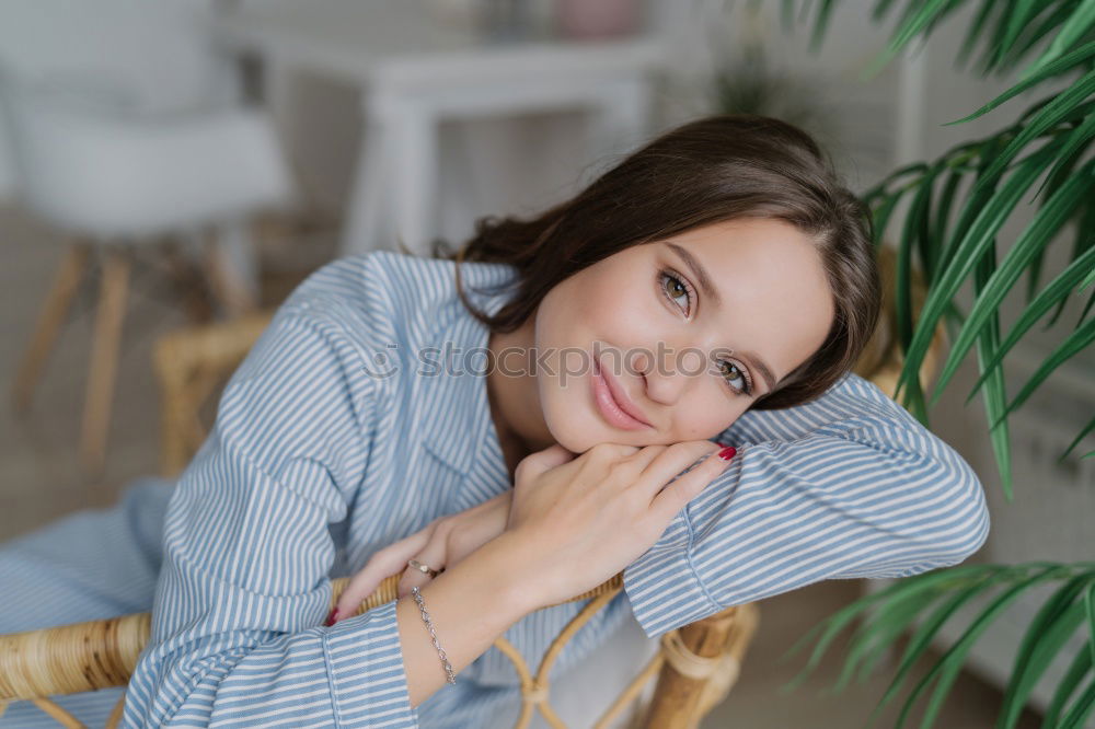 Similar – Image, Stock Photo Young woman resting on armchair