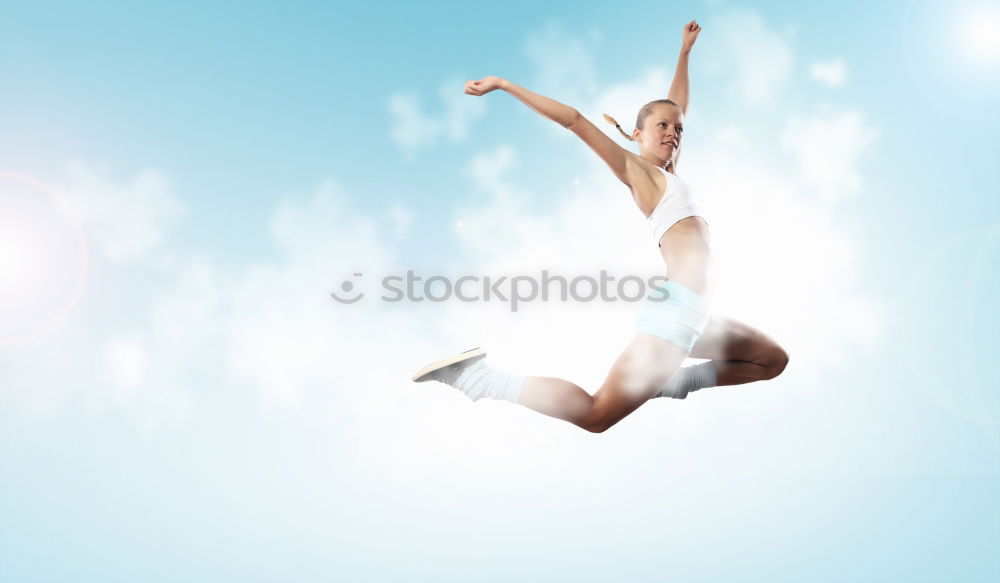 Similar – Image, Stock Photo Strong white woman jumping in the air during contemporary dance performing.