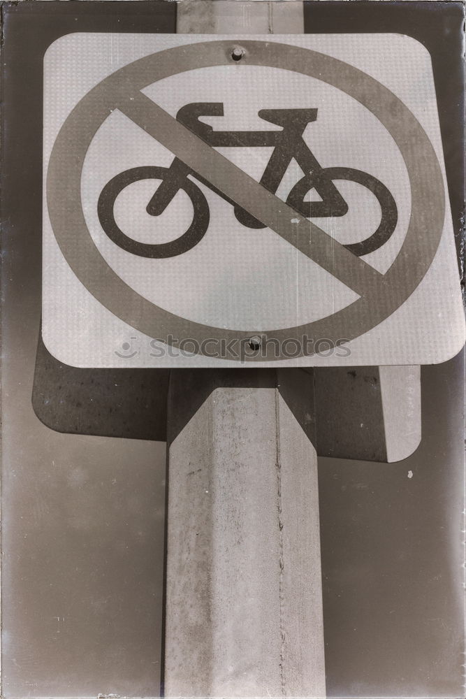 Similar – Signs I In front of a yellow house on the left and right side of the road there are traffic signs