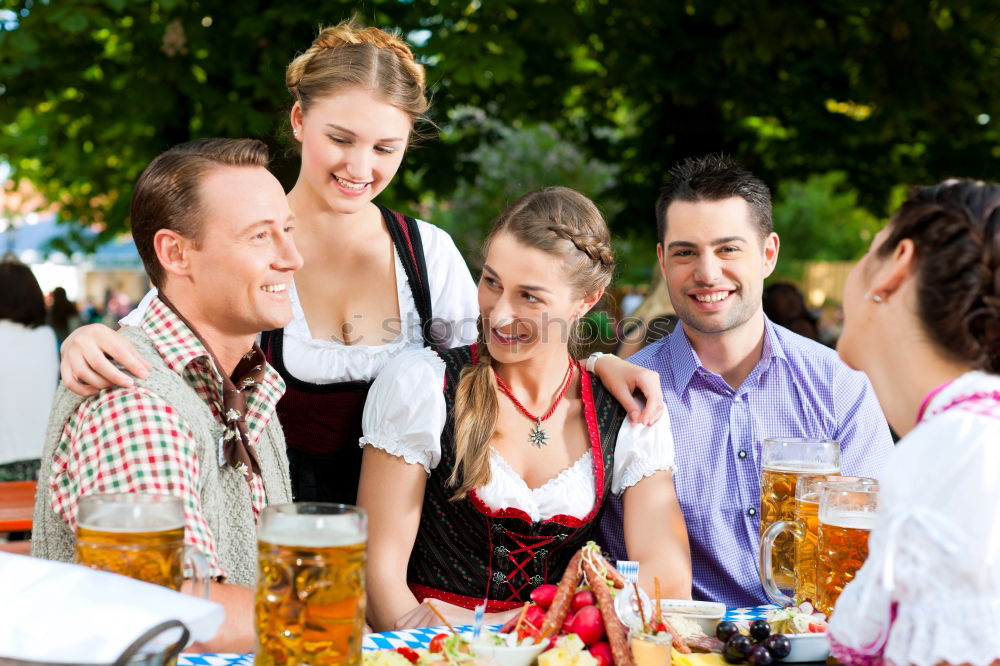 Similar – Foto Bild Freundinnen in traditioneller bayerischer Kleidung Dirndl oder Tracht mit Schenk mir dein Herz, Du bist die beste auf Lebkuchenherz auf dem Oktoberfest geschrieben