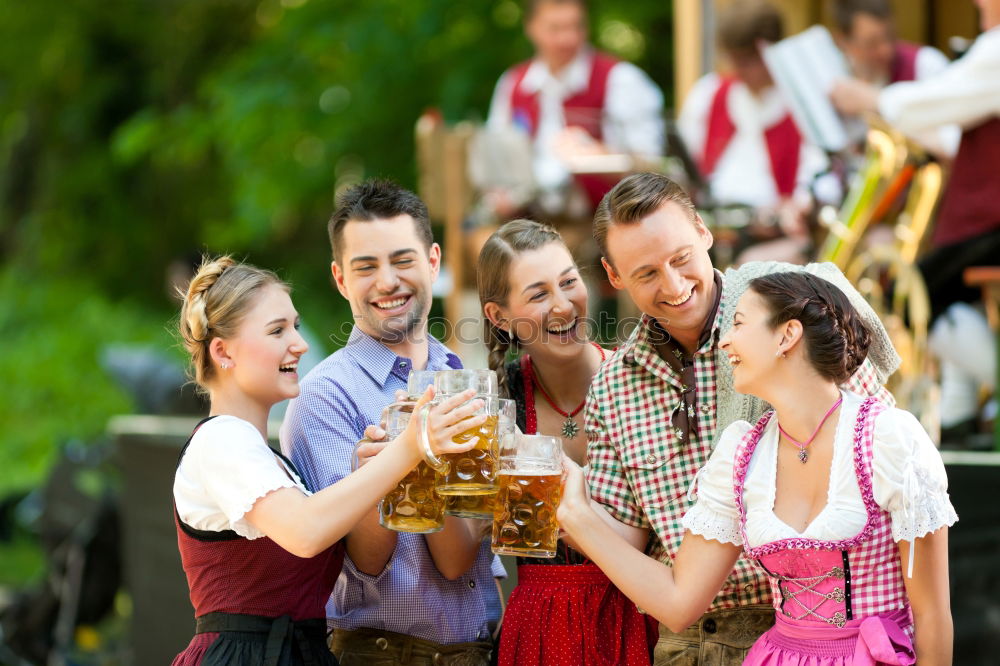 Similar – Foto Bild Freundinnen in traditioneller bayerischer Kleidung Dirndl oder Tracht mit Schenk mir dein Herz, Du bist die beste auf Lebkuchenherz auf dem Oktoberfest geschrieben