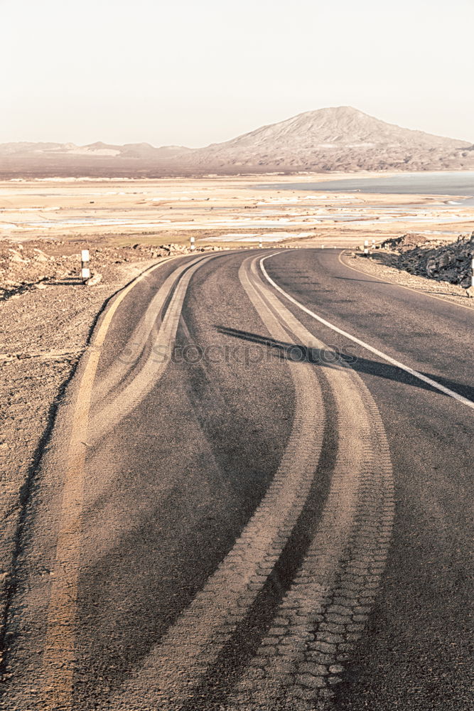 Similar – Image, Stock Photo Car driving on road in picturesque desert