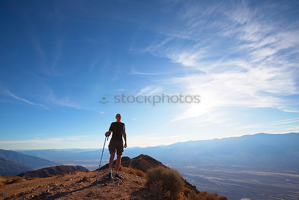 Similar – Image, Stock Photo Skyrunner runs uphill along a mountain trail.