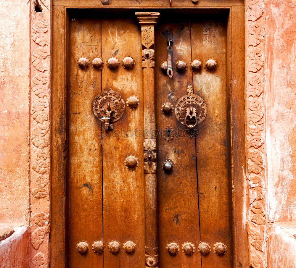 Image, Stock Photo Ancient door knocker on a wooden door