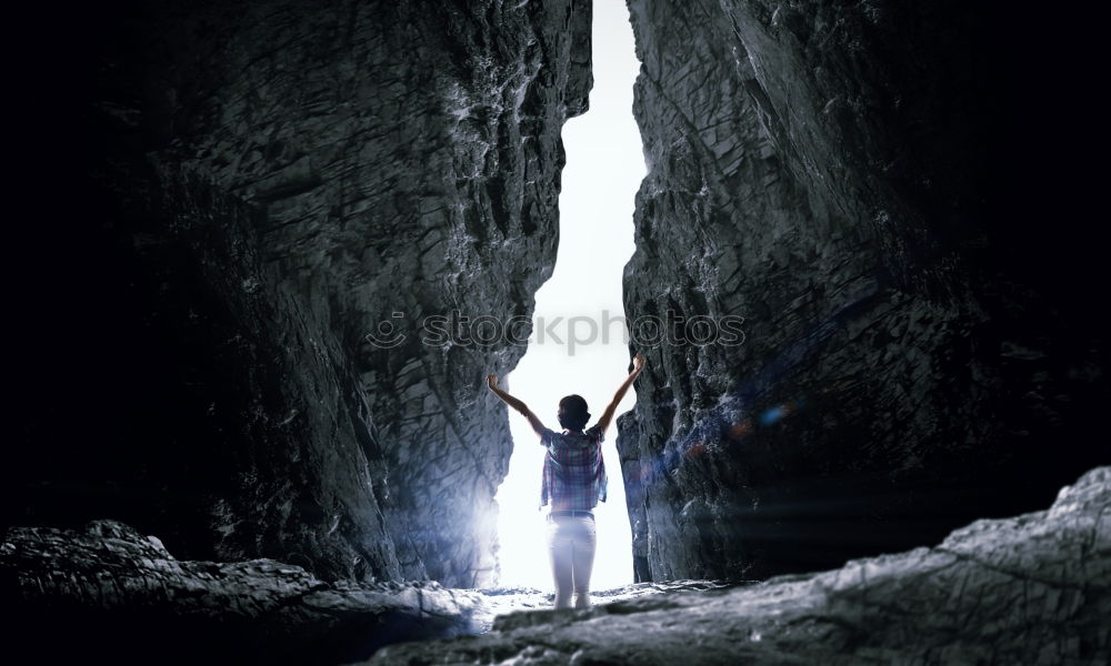 Similar – A man climbing on the rock from magnesium, mountain at dusk.