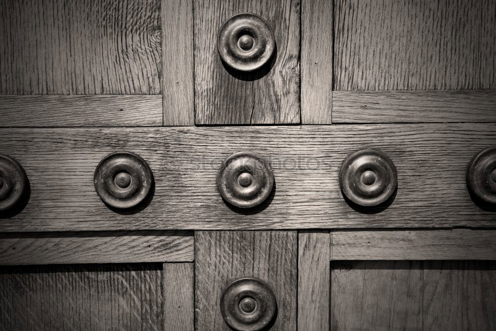 Similar – House number 37 on a dark wooden front door with crooked hook