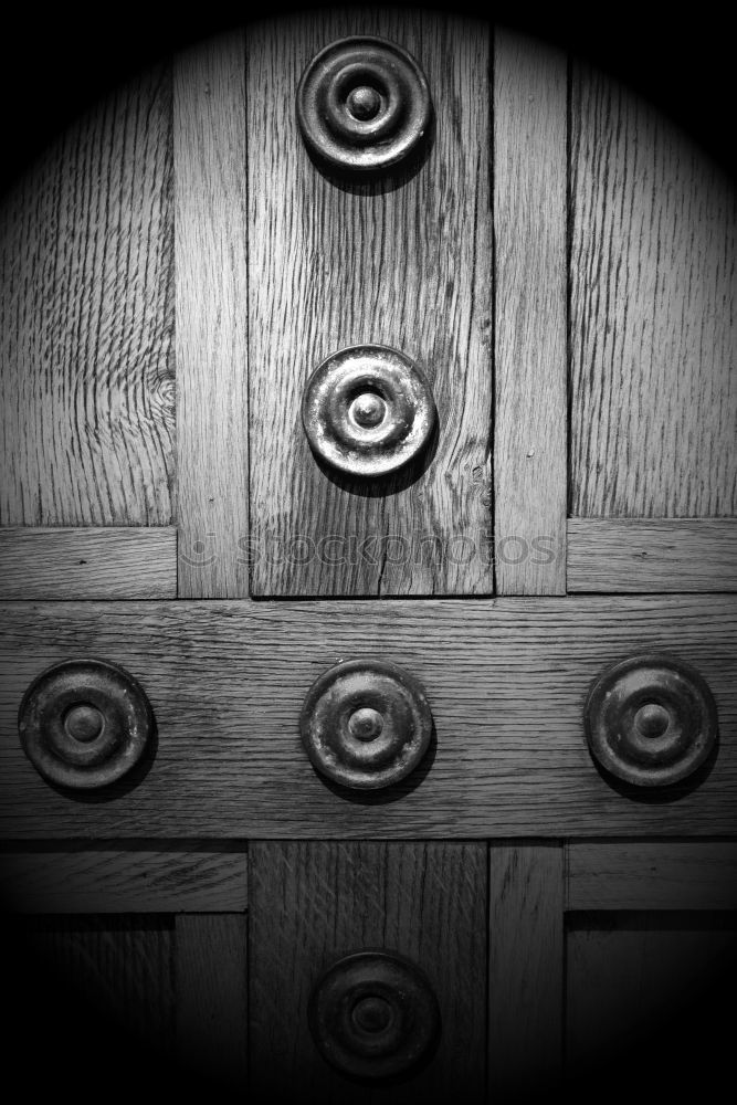 Similar – House number 37 on a dark wooden front door with crooked hook