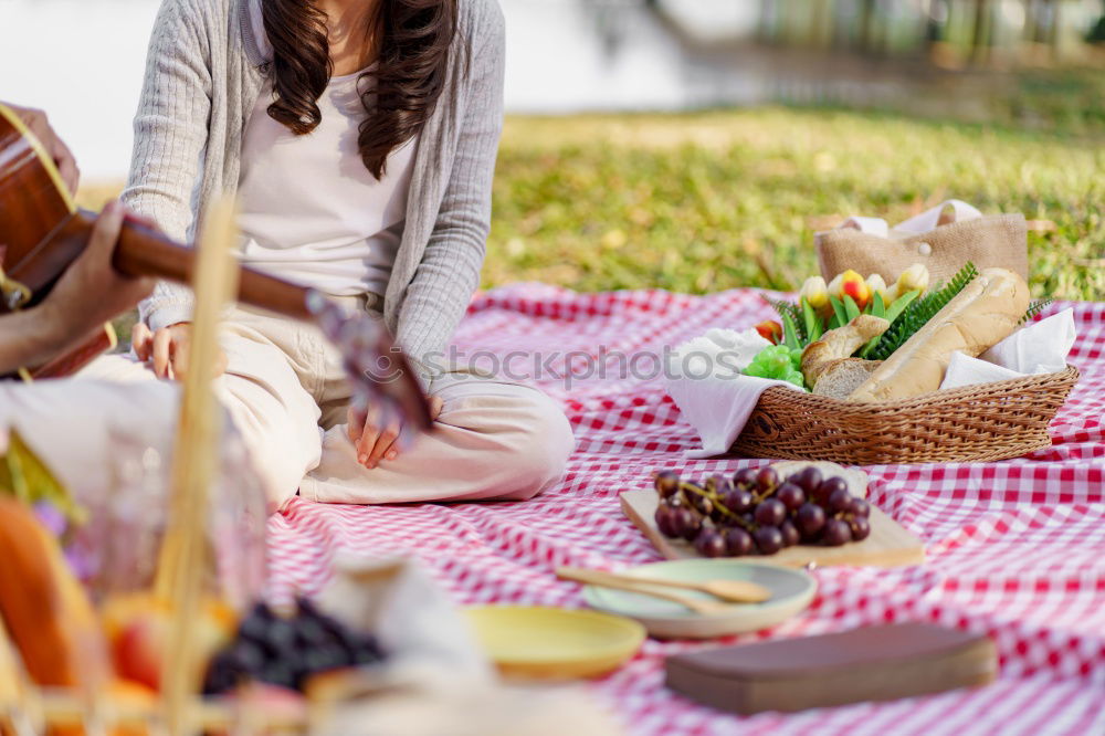 Similar – Group of People enjoying food and wine at restaurant